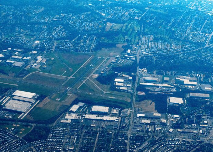 Aerial view of Northeast Philadelphia Airport (PNE) located in Northeast Philadelphia. The image shows the airport's runways and surrounding infrastructure.